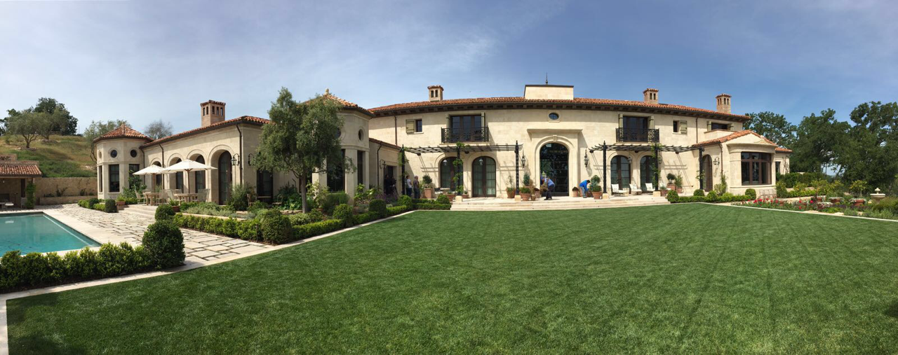 Full estate panorama with pool and manicured grounds